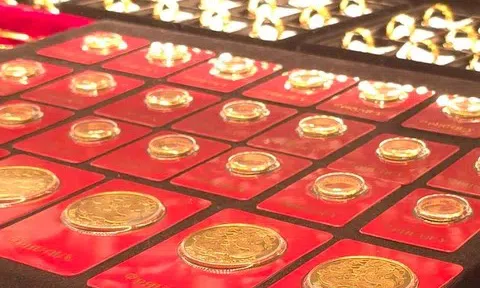 Giá vàng giảm 1,5 triệu/lượng, USD hạ nhiệt